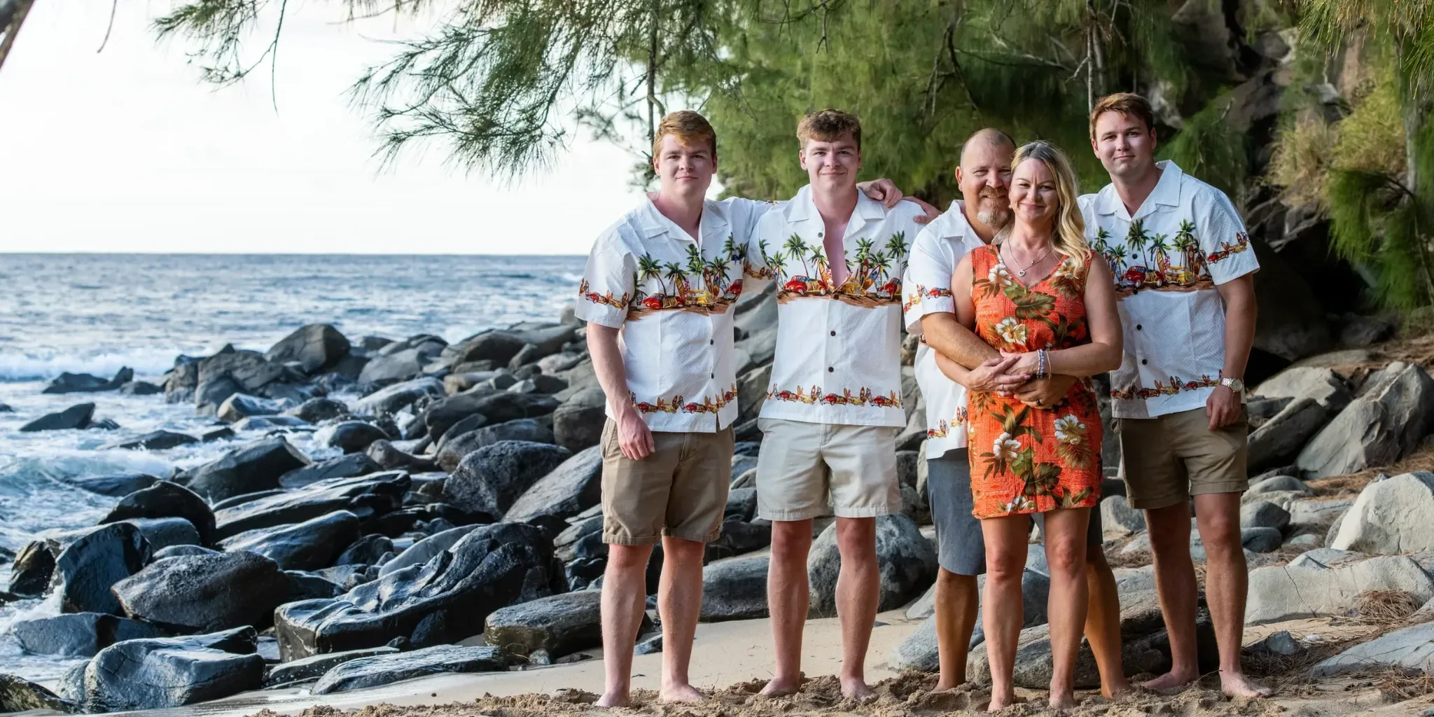Lisa and Dean Stephens with their sons on the coast